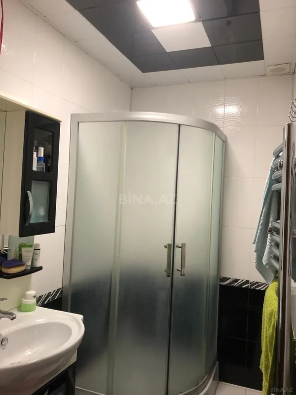 Satılır 4 otaqlı mənzil 135 m²