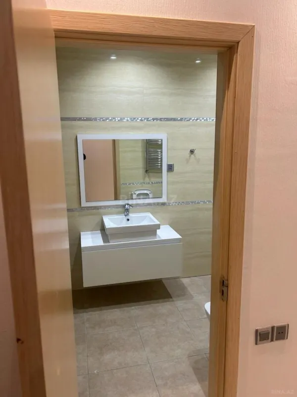 Satılır 4 otaqlı mənzil 200 m²