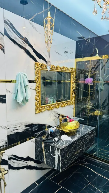 Satılır 4 otaqlı mənzil 215 m²