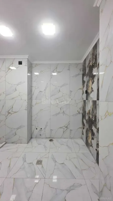 Satılır 4 otaqlı mənzil 103 m²