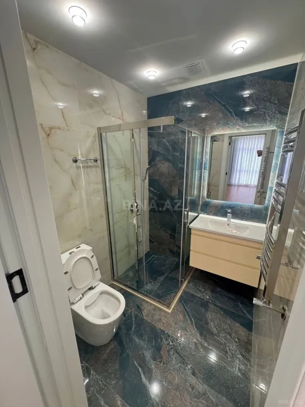 Satılır 4 otaqlı mənzil 137 m²