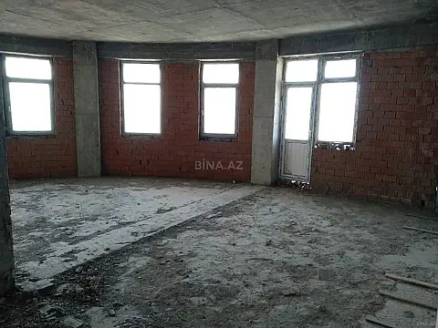 Satılır 4 otaqlı mənzil 214 m²