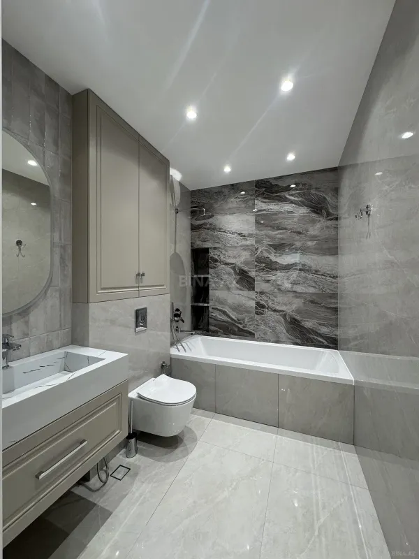 Satılır 4 otaqlı mənzil 180 m²