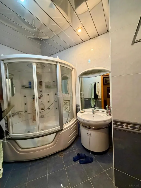 Satılır 4 otaqlı mənzil 164 m²