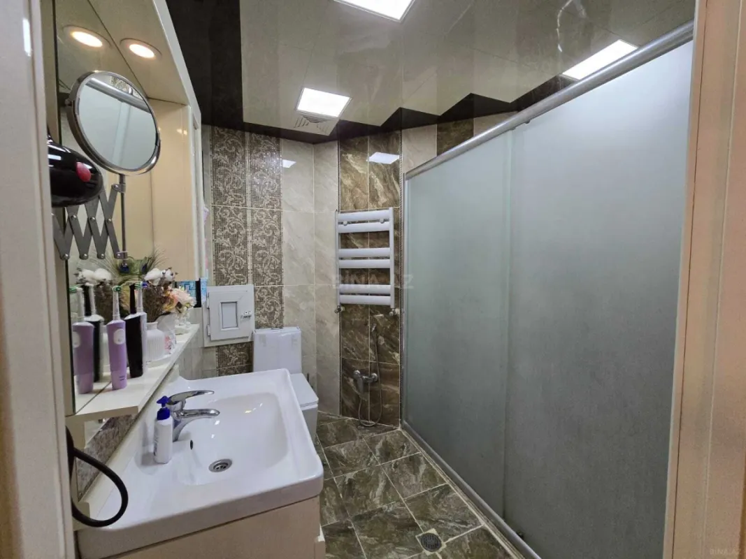 Satılır 4 otaqlı mənzil 158 m²