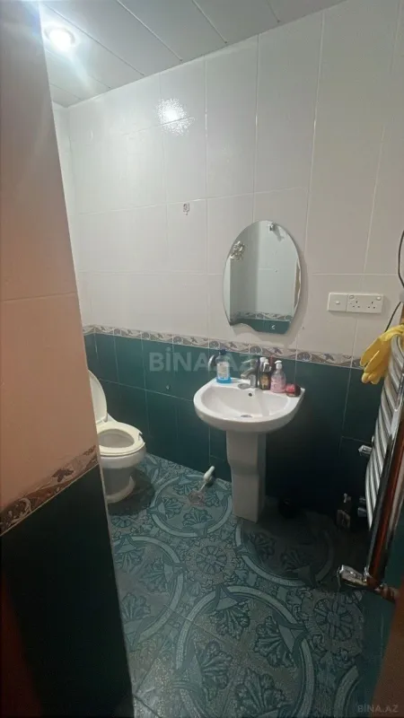 Satılır 4 otaqlı mənzil 124 m²