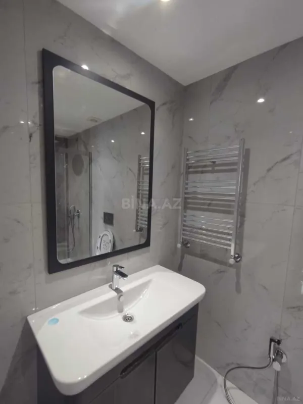 Satılır 4 otaqlı mənzil 122 m²