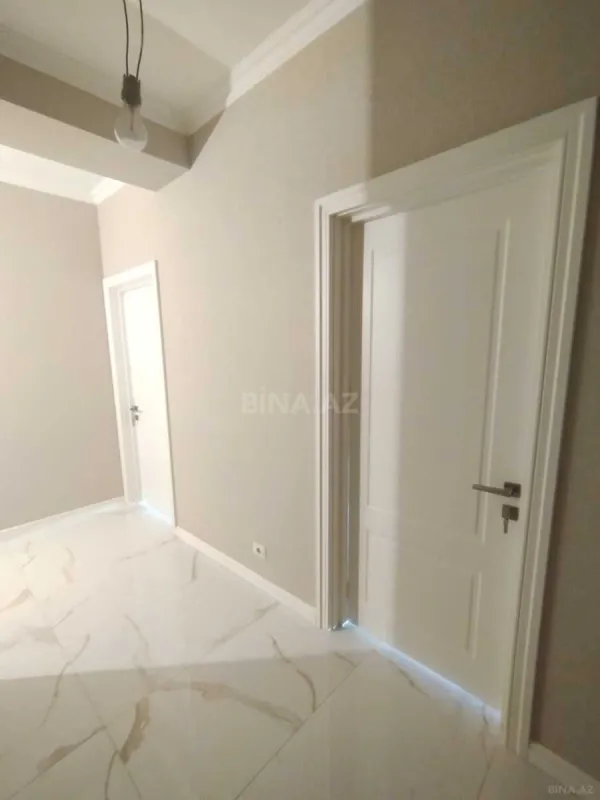 Satılır 4 otaqlı mənzil 122 m²