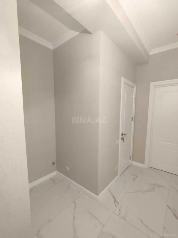 Satılır 4 otaqlı mənzil 122 m²