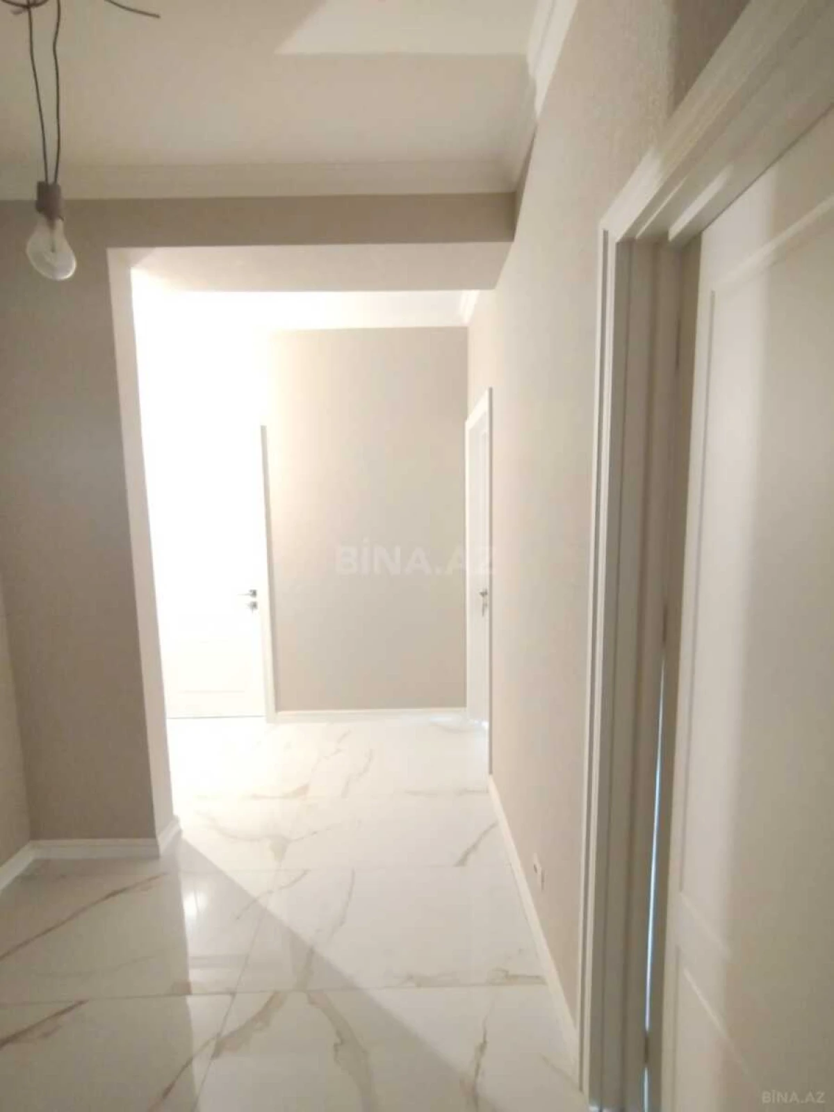Satılır 4 otaqlı mənzil 122 m²