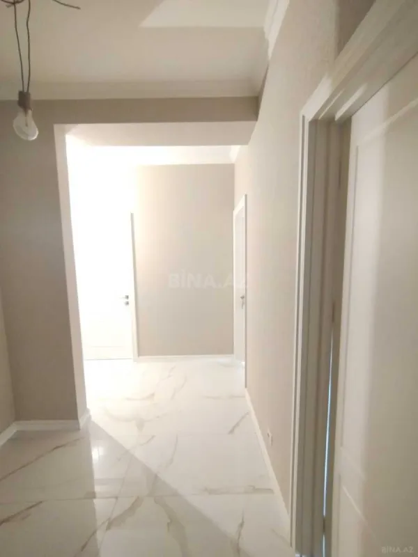 Satılır 4 otaqlı mənzil 122 m²
