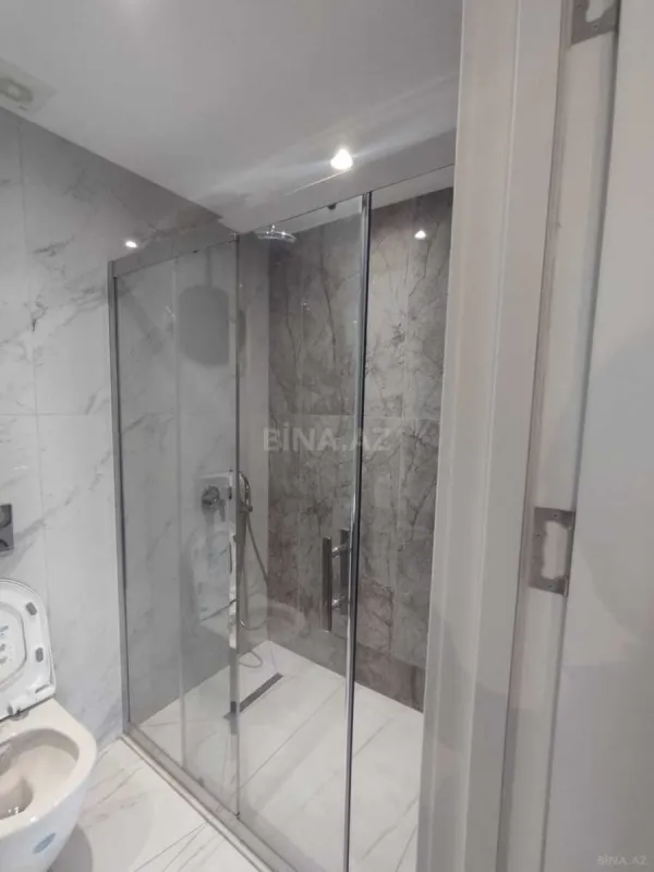 Satılır 4 otaqlı mənzil 122 m²
