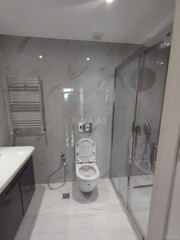 Satılır 4 otaqlı mənzil 122 m²