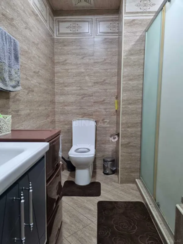 Satılır 4 otaqlı mənzil 115 m²