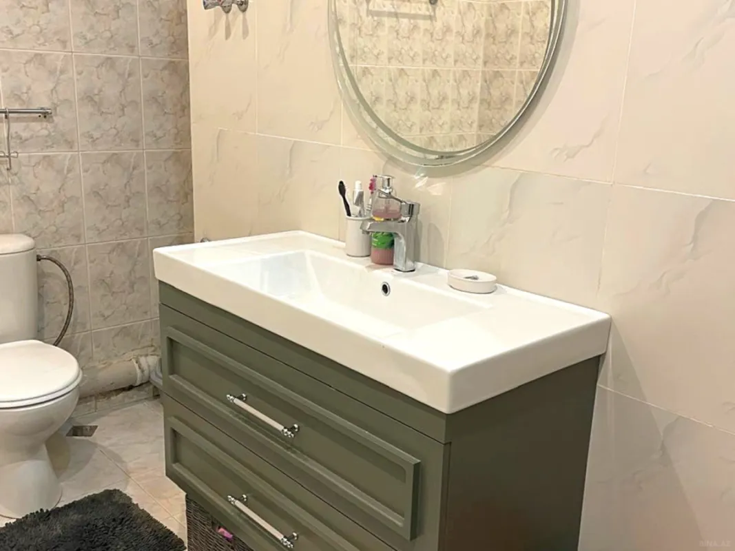 Satılır 4 otaqlı mənzil 210 m²