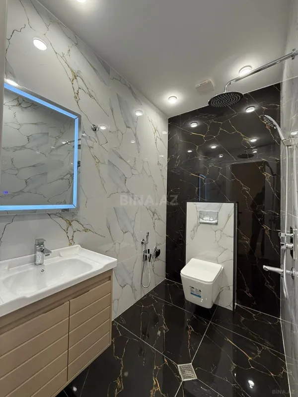 Satılır 4 otaqlı mənzil 140 m²