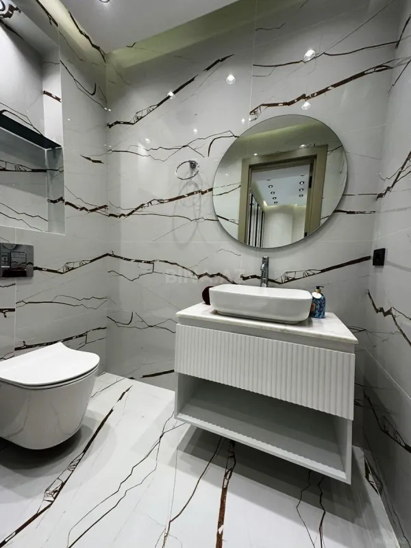 Satılır 4 otaqlı mənzil 180 m²