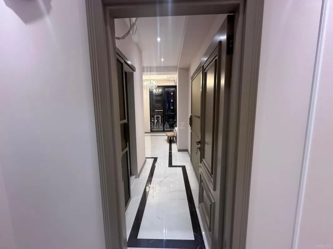 Satılır 4 otaqlı mənzil 129 m²
