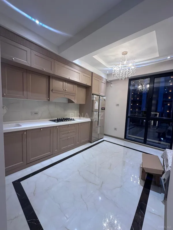 Satılır 4 otaqlı mənzil 129 m²