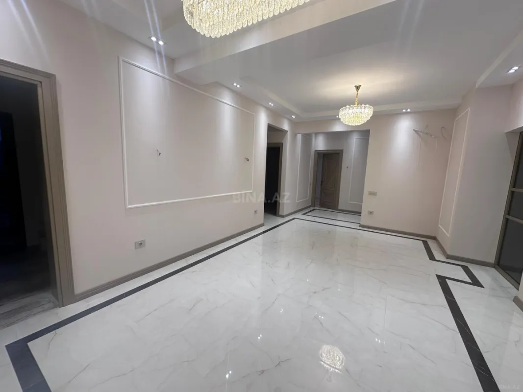 Satılır 4 otaqlı mənzil 129 m²