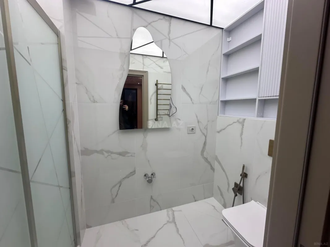 Satılır 4 otaqlı mənzil 129 m²