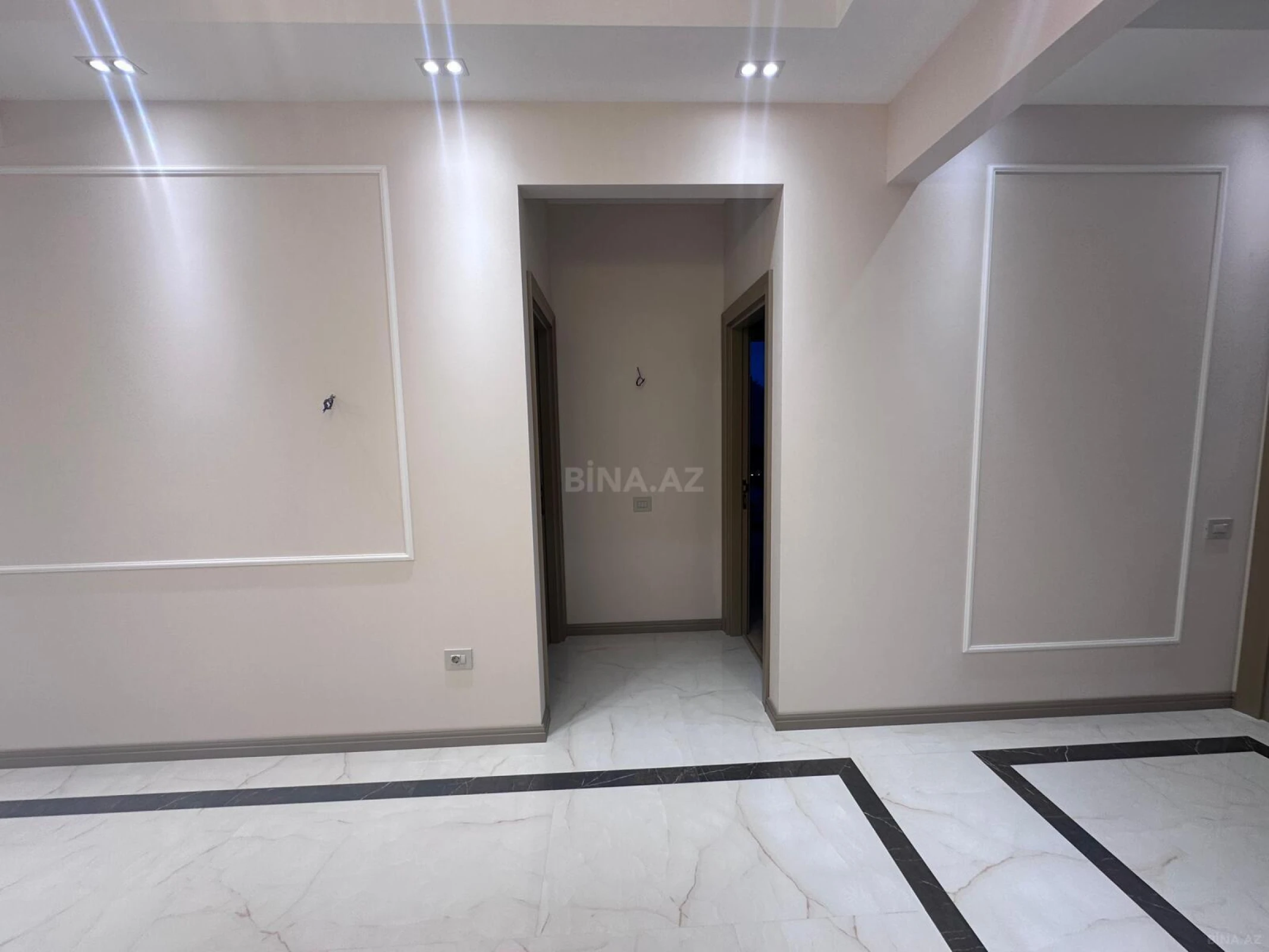 Satılır 4 otaqlı mənzil 129 m²
