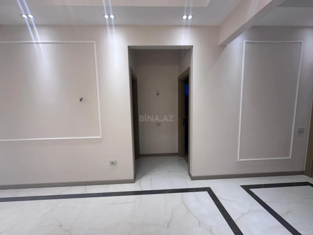 Satılır 4 otaqlı mənzil 129 m²