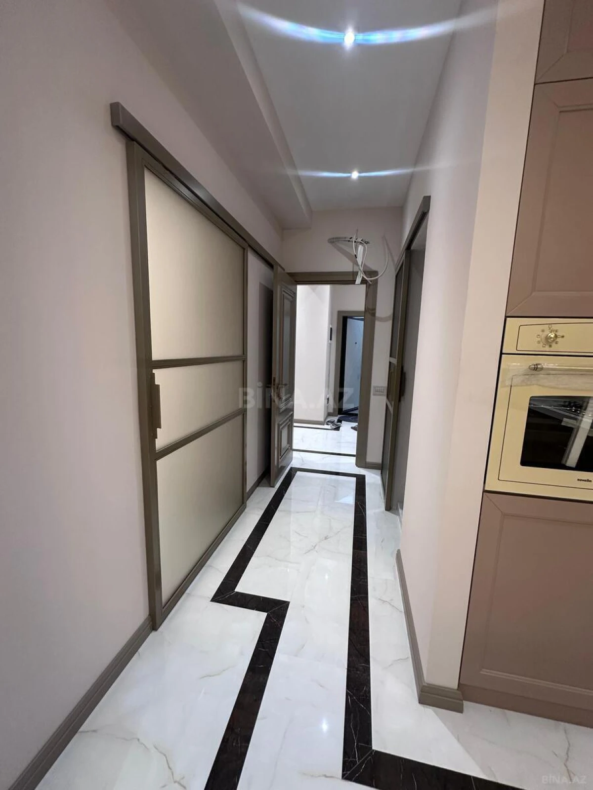 Satılır 4 otaqlı mənzil 129 m²