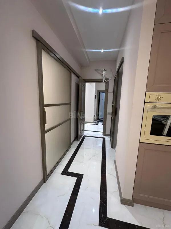 Satılır 4 otaqlı mənzil 129 m²