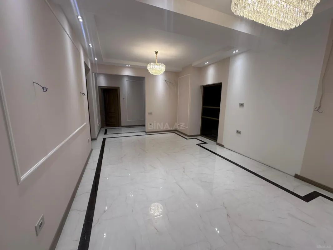 Satılır 4 otaqlı mənzil 129 m²