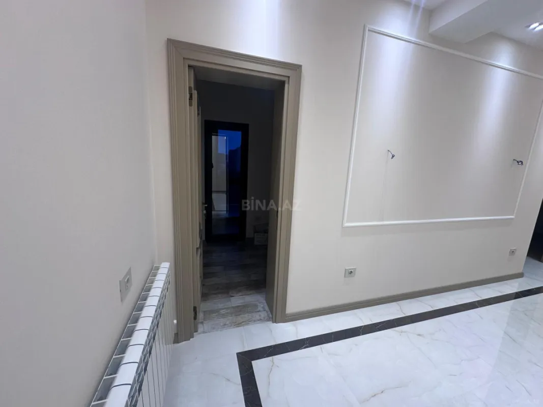 Satılır 4 otaqlı mənzil 129 m²