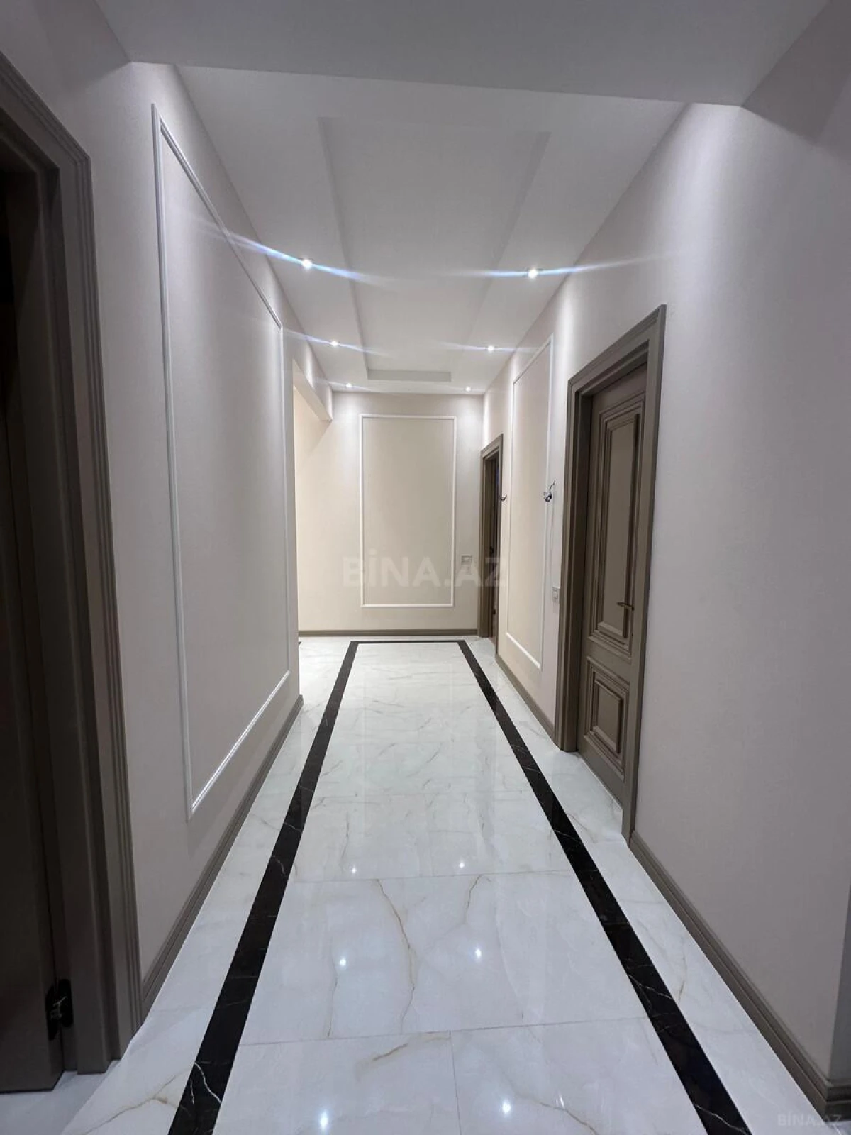Satılır 4 otaqlı mənzil 129 m²
