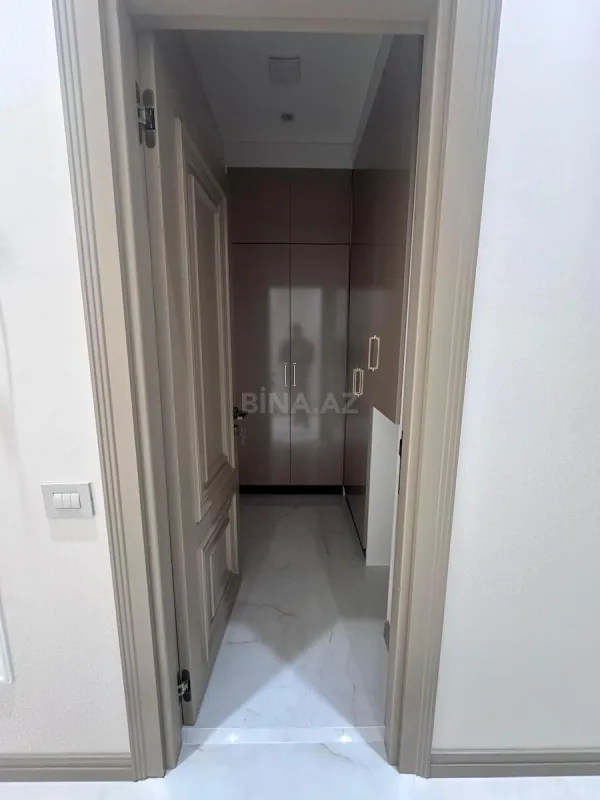 Satılır 4 otaqlı mənzil 129 m²
