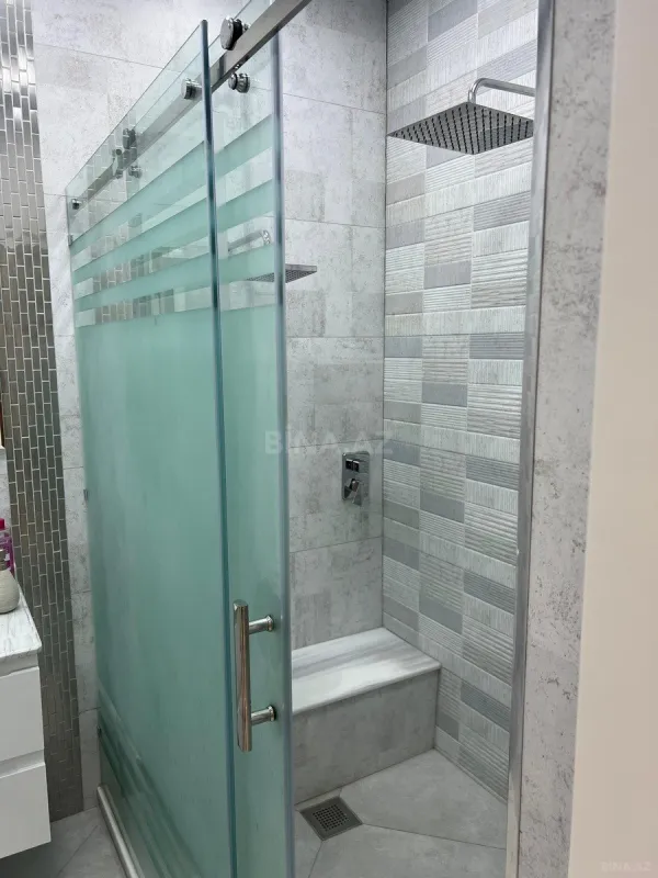 Satılır 3 otaqlı mənzil 148 m²