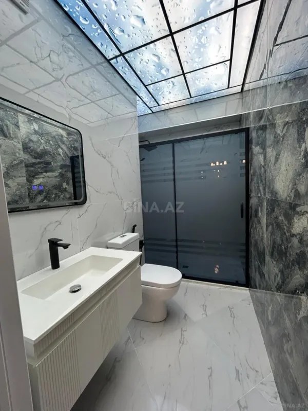 Satılır 4 otaqlı mənzil 153 m²