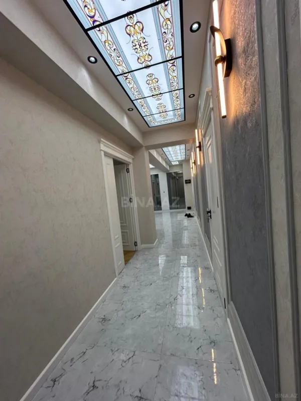 Satılır 4 otaqlı mənzil 153 m²