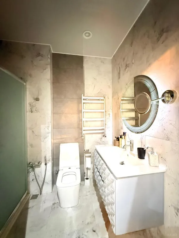 Satılır 4 otaqlı mənzil 145 m²