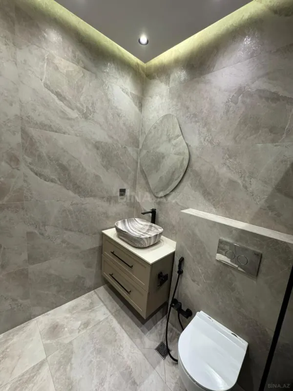Satılır 3 otaqlı mənzil 135 m²