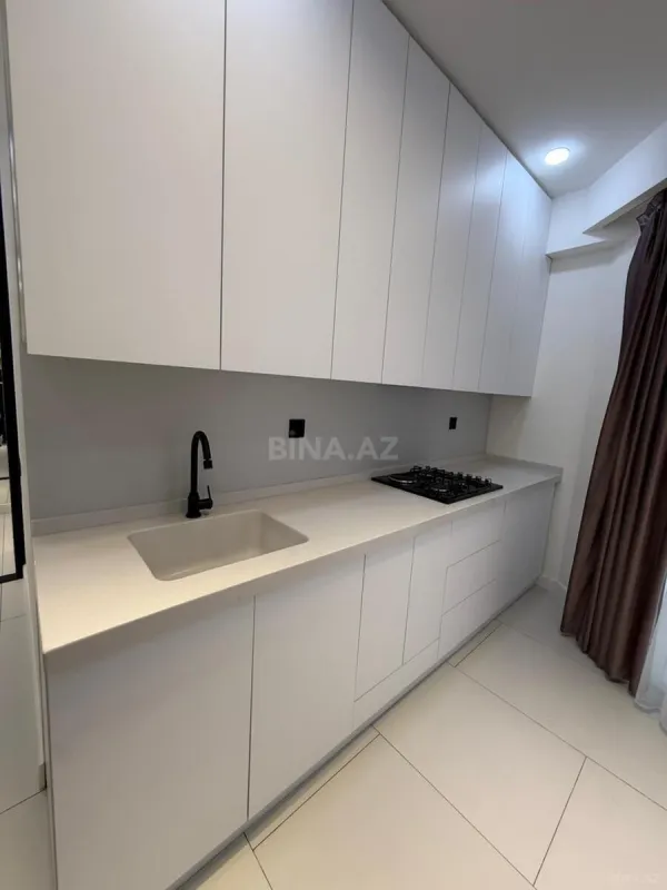 Satılır 3 otaqlı mənzil 121 m²