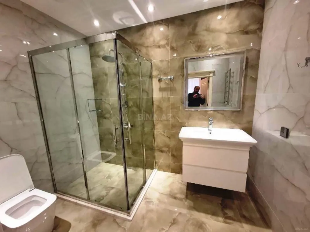 Satılır 4 otaqlı mənzil 210 m²