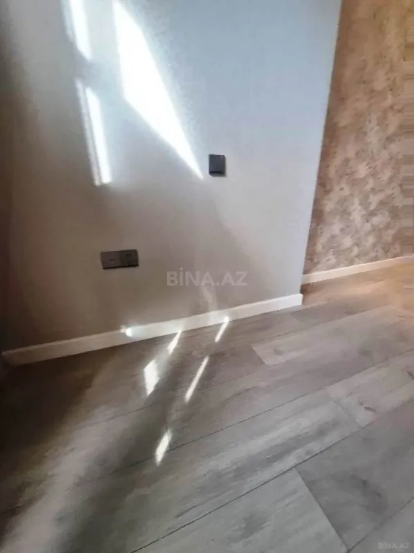 Satılır 4 otaqlı mənzil 210 m²