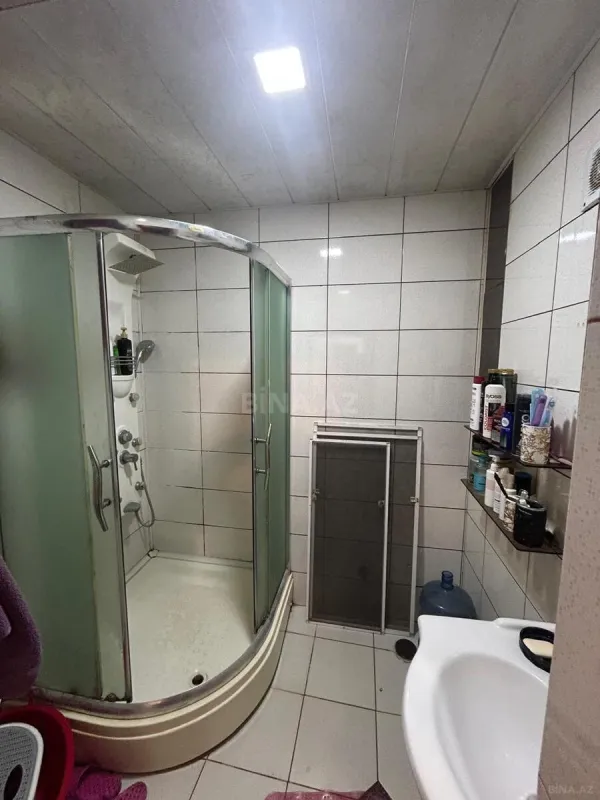 Satılır 4 otaqlı mənzil 138 m²