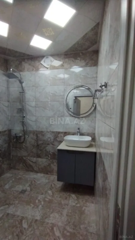 Satılır 4 otaqlı mənzil 105 m²