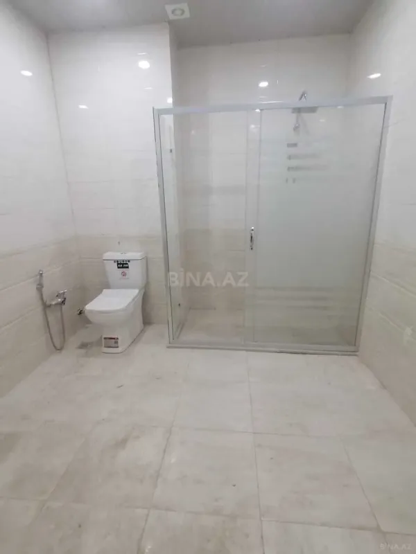 Satılır 4 otaqlı mənzil 147 m²