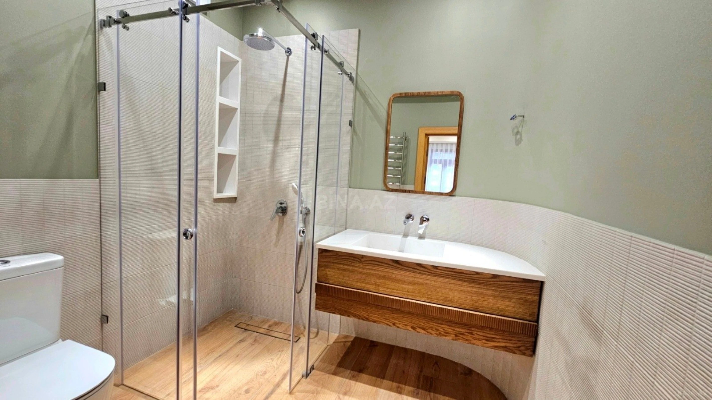 Satılır 4 otaqlı mənzil 164 m²