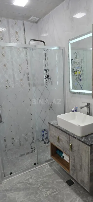 Satılır 5 otaqlı mənzil 107 m²