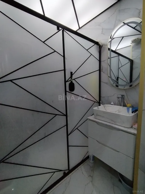 Satılır 4 otaqlı mənzil 115 m²