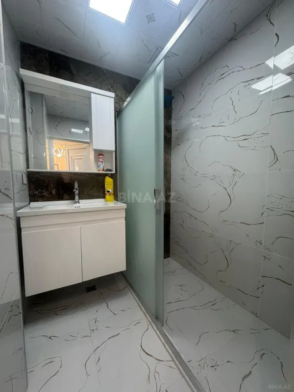 Satılır 4 otaqlı mənzil 100 m²