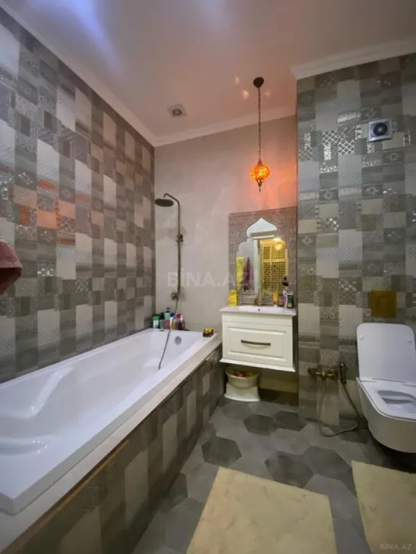 Satılır 4 otaqlı mənzil 160 m²