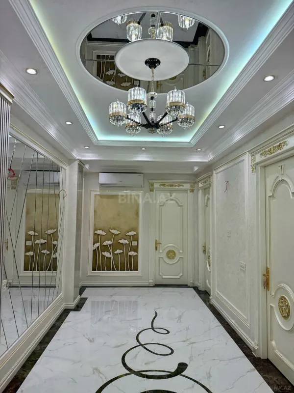Satılır 4 otaqlı mənzil 165 m²